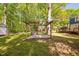 Backyard showing a pergola and surrounding trees at 3312 Shannon Cir, Apex, NC 27539