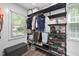 Walk-in closet with built-in shelving units, providing ample storage space and organization at 3312 Shannon Cir, Apex, NC 27539