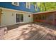 Exterior view of a home featuring a wood deck with access to the screened-in porch at 3312 Shannon Cir, Apex, NC 27539