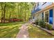 Landscaped front yard with a sidewalk leading to the home's entryway at 3312 Shannon Cir, Apex, NC 27539