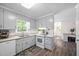 Bright kitchen with white appliances at 3312 Shannon Cir, Apex, NC 27539