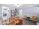 Open living room featuring wood floors and stairs at 3312 Shannon Cir, Apex, NC 27539