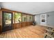 Enclosed wooden porch providing ample space for seating and enjoying the outdoors at 3312 Shannon Cir, Apex, NC 27539