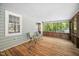 View of enclosed wooden porch with natural light and scenic outdoor views at 3312 Shannon Cir, Apex, NC 27539