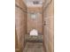 Close up of shower with bench seating, a shower niche, and decorative tiling at 3317 E Jameson Rd, Raleigh, NC 27604