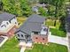 Aerial view of the home with modern architecture and landscaped yard at 337 Merrywood Dr, Raleigh, NC 27610