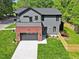 Modern two-story home with well-kept lawn and stylish exterior at 337 Merrywood Dr, Raleigh, NC 27610