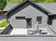 Exterior of house featuring a patio with a table and chairs at 337 Merrywood Dr, Raleigh, NC 27610