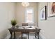 Cozy home office space with a wooden desk, stylish decor, and natural light at 337 Merrywood Dr, Raleigh, NC 27610