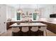 Spacious kitchen with island seating, custom cabinets, and stainless steel appliances at 337 Merrywood Dr, Raleigh, NC 27610