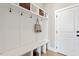 Clean mudroom with storage and a bench at 337 Merrywood Dr, Raleigh, NC 27610