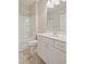 Bathroom with a shower-tub combo, tile flooring, and a white vanity at 367 Fenella Dr, Four Oaks, NC 27524
