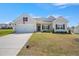 Beautiful single-Gathering home with manicured lawn, two-car garage, and classic design at 367 Fenella Dr, Four Oaks, NC 27524