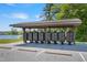 Community mailboxes under a covered shelter near parking spots at 367 Fenella Dr, Four Oaks, NC 27524