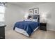 A charming bedroom with a cozy bed, complemented by whimsical artwork and playful pillows, perfect for a  at 368 N Coral Bells Way, Four Oaks, NC 27524