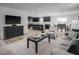 Spacious living room and dining area providing open concept living and easy transition to the kitchen at 368 N Coral Bells Way, Four Oaks, NC 27524