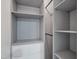 Organized closet space featuring shelving, drawers, and ample storage options at 3806 Sue Ln, Raleigh, NC 27604