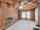 Spacious living room with cozy fireplace and unique wood ceiling at 3806 Sue Ln, Raleigh, NC 27604