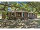 Charming brick home with a covered front porch and blue front door at 419 Joy Dr, Garner, NC 27529