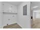 A mud room with white walls and cabinets, and vinyl flooring at 419 Joy Dr, Garner, NC 27529