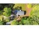 Aerial view of the home showing the layout of the roof, driveway, and property at 4500 Governor Hunt St, Efland, NC 27243