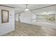 Inviting hallway with wood-look floors and an open layout that seamlessly connects the living spaces at 4500 Governor Hunt St, Efland, NC 27243