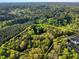 Approximate property lines of a wooded lot highlighting the natural landscape of the property at 452 Dogwood Trl, Henderson, NC 27537
