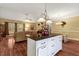 Open concept kitchen features a large center island perfect for food prep and casual dining at 452 Dogwood Trl, Henderson, NC 27537