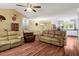 Spacious living room boasts an open-concept design with abundant seating and seamless access to the kitchen at 452 Dogwood Trl, Henderson, NC 27537