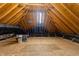 Spacious unfinished attic with exposed rafters offering potential for future build-out at 5016 Dillswood Ln, Raleigh, NC 27606