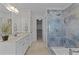 Bathroom boasts a blue marble tiled walk-in shower, and double sink vanity at 5016 Dillswood Ln, Raleigh, NC 27606