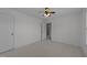 Bedroom features carpet, white trim, and a ceiling fan at 5016 Dillswood Ln, Raleigh, NC 27606