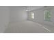 Bedroom with carpet and two large windows at 5016 Dillswood Ln, Raleigh, NC 27606