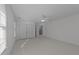 Large bedroom features carpet, natural light, and closet at 5016 Dillswood Ln, Raleigh, NC 27606