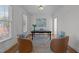 Elegant home office featuring hardwood floors, neutral walls, and ample natural light at 5016 Dillswood Ln, Raleigh, NC 27606
