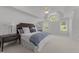 Large bedroom with tray ceilings, a ceiling fan, and lots of natural light at 5016 Dillswood Ln, Raleigh, NC 27606