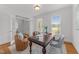 Bright home office with hardwood floors, lots of light, and comfortable seating at 5016 Dillswood Ln, Raleigh, NC 27606