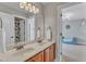 Bathroom with double sinks and updated fixtures at 5109 Dove Forest Ln, Apex, NC 27539