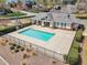 Community pool and clubhouse area with covered patio and landscaping at 5109 Dove Forest Ln, Apex, NC 27539