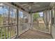 An upstairs porch with decorative columns and a railing overlooking the neighborhood at 5109 Dove Forest Ln, Apex, NC 27539