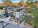 Modern townhome featuring a stylish exterior, manicured landscaping, and a welcoming entrance at 512 Edgecreek Ct, Raleigh, NC 27604