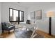 Bright home office with a modern white desk, comfortable chair, and stylish decor at 512 Edgecreek Ct, Raleigh, NC 27604
