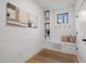 Bright mudroom with built in bench and shelves at 513 Edgecreek Ct, Raleigh, NC 27604