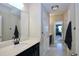 Neutral bathroom with vanity with a light countertop and black fixtures and tile flooring at 547 Historic Dr, Hillsborough, NC 27278