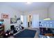 Bedroom with bunk bed, a dark plush rug and multiple doors at 547 Historic Dr, Hillsborough, NC 27278