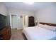 Bedroom featuring a neutral color palette, a large window, and comfortable bedding at 547 Historic Dr, Hillsborough, NC 27278