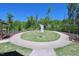 Well-maintained common area with swing benches and lush landscaping for residents to enjoy at 547 Historic Dr, Hillsborough, NC 27278