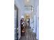 Inviting foyer with hardwood floors, neutral walls, and staircase leading to the upper level of the house at 547 Historic Dr, Hillsborough, NC 27278