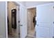 Hallway with multiple access points leading to the various rooms and features of the home at 547 Historic Dr, Hillsborough, NC 27278