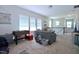 Spacious upstairs living room showcases large windows and ample space for entertainment at 547 Historic Dr, Hillsborough, NC 27278